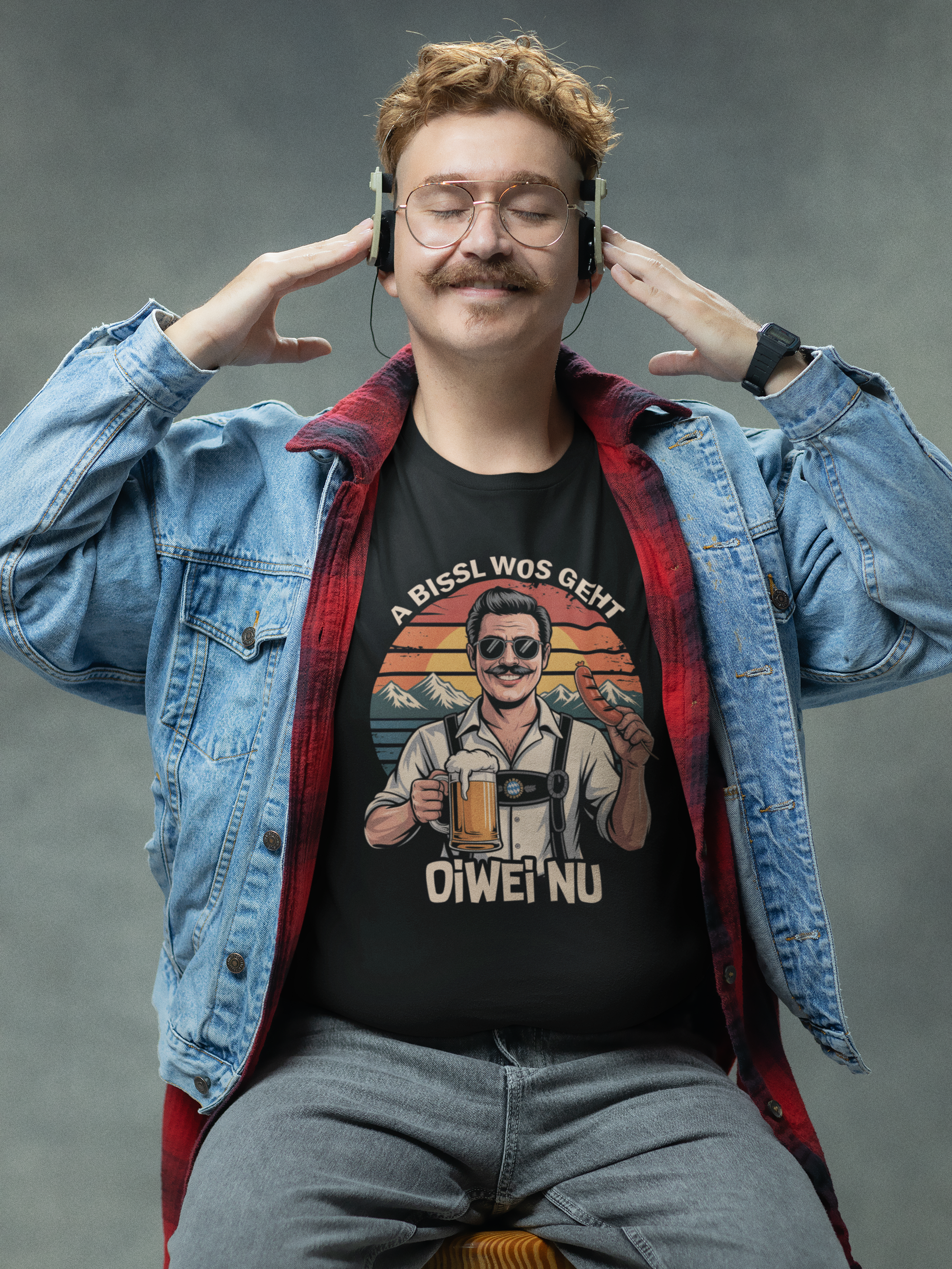 Junger Mann trägt schwarzes T-Shirt mit Sonnenbrillen-Bayer und frechem Spruch, Oberkörperansicht